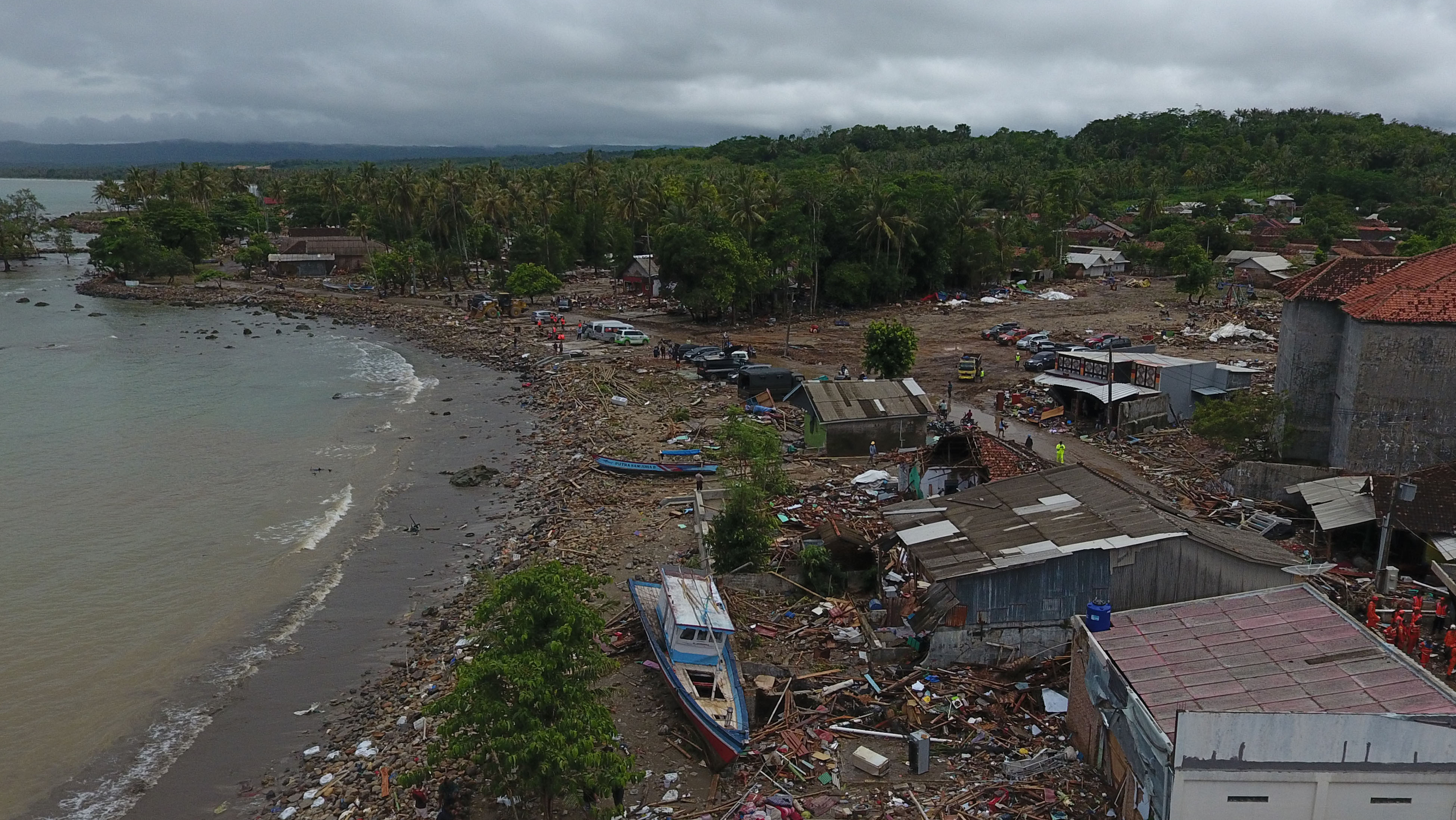 Damaged Houses Boats And Debris Are Seen After A Tsunami In This