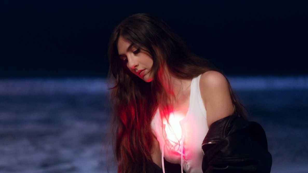 Featured image for “The Personal Apocalypse of Weyes Blood’s ‘And In The Darkness, Hearts Aglow’”